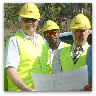 Fr Frank Brennan and Bob Katter with Mayor Alf Lacey and councillors of Palm Island inspecting new subdivision.