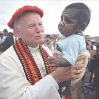 Pope John Paul II hold Aboriginal boy Liam during his famous visit to Alice Springs