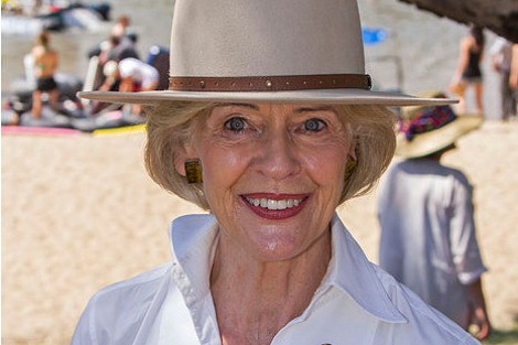 Quentin Bryce smiling, in a hat